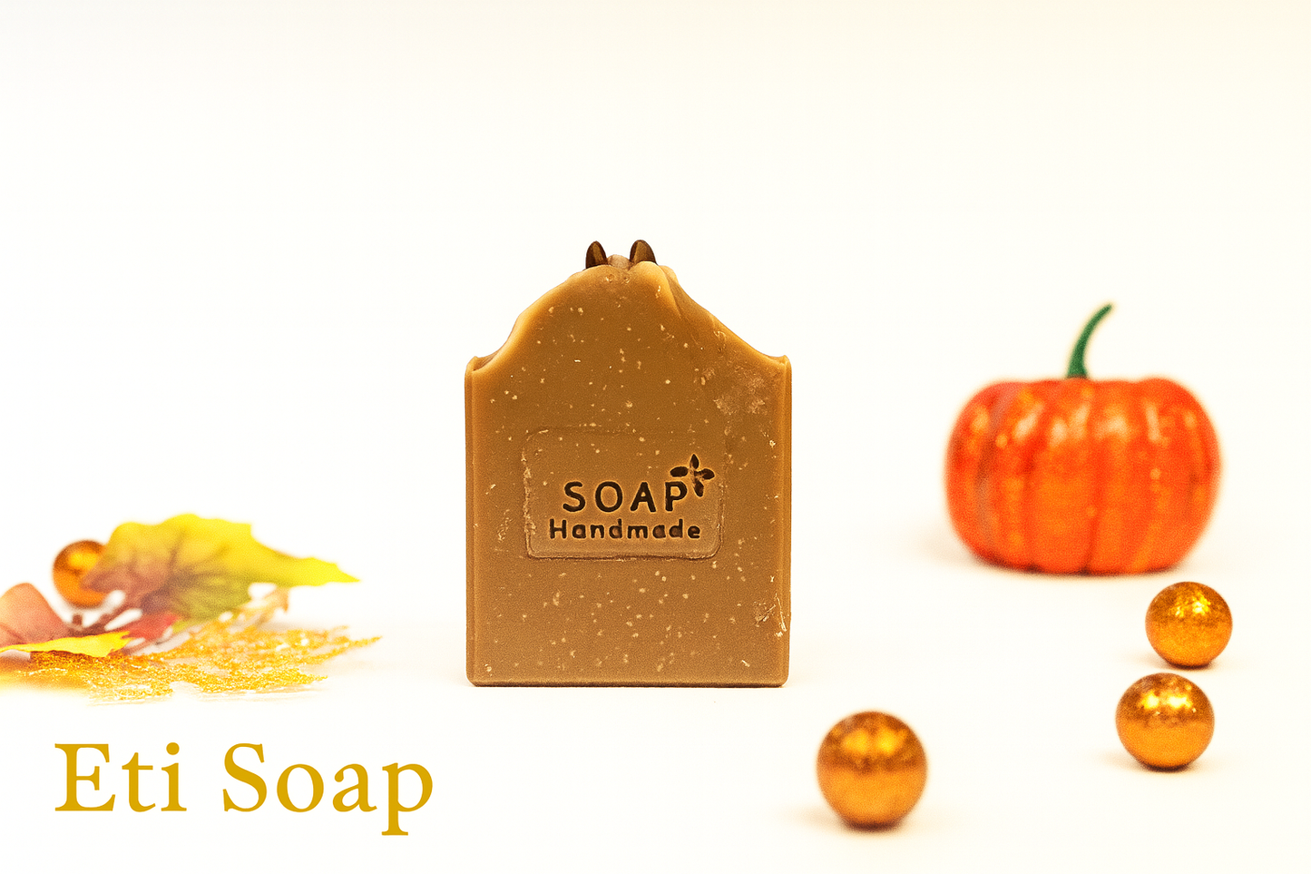 Handmade caramel coffee soap featuring gentle exfoliation from dried coffee beans and rich artisan design.