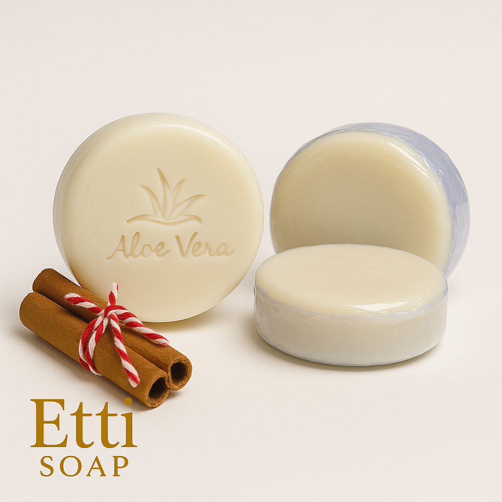 Aloe Vera soap bar with a container and cinnamon sticks on a light background, featuring the brand 'Etti Soap'.