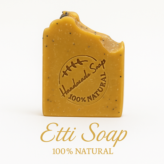 Golden Glow Turmeric Soap handmade with organic turmeric, lemon essential oil, and poppy seeds for gentle exfoliation.