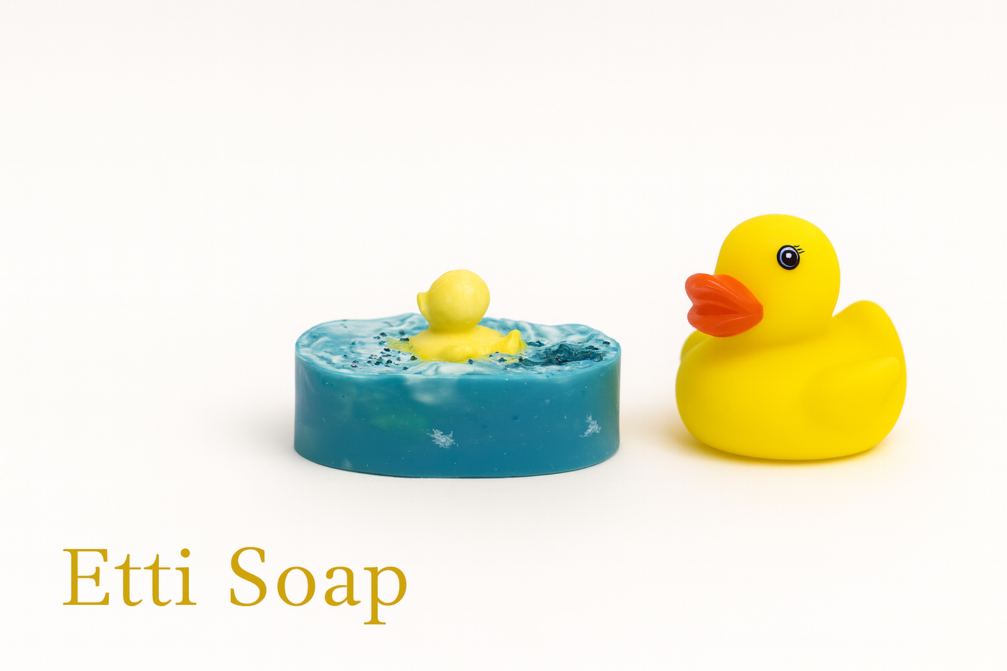 Blue Rub-A-Duck handmade soap bar with a yellow duck design by Etti Soap, fun eco-friendly soap for kids and gifts