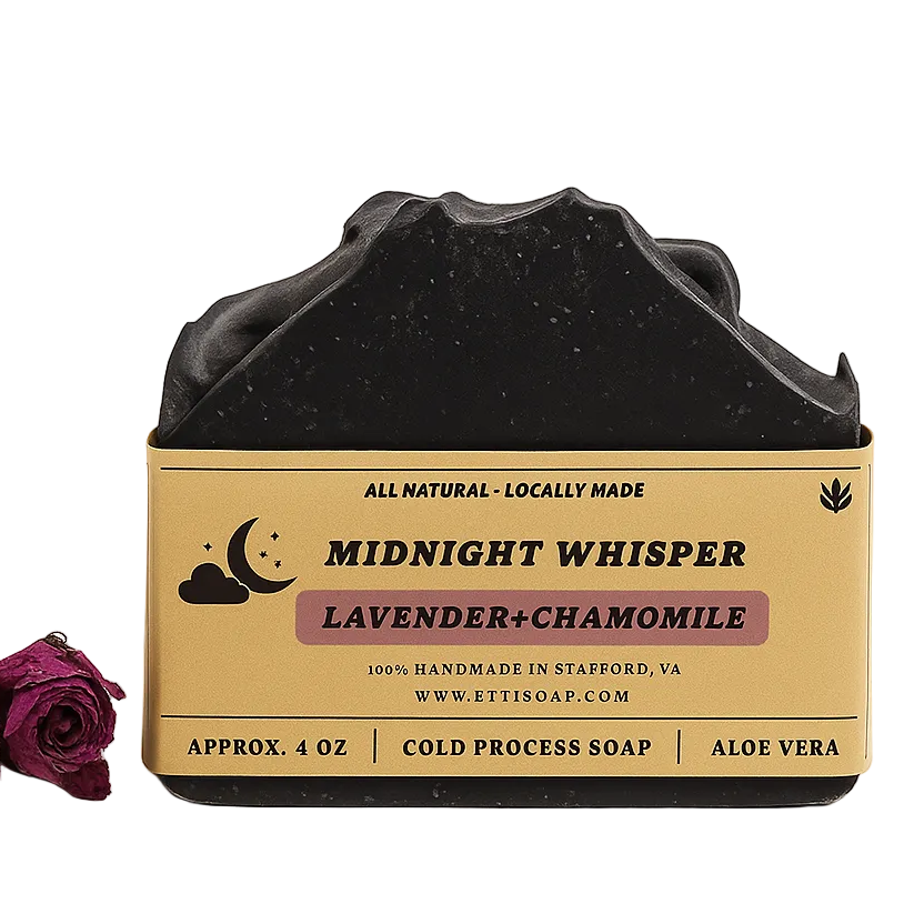 Black soap bar with 'Midnight Whisper' label and a purple rose on a white background, featuring Etti Soap branding.