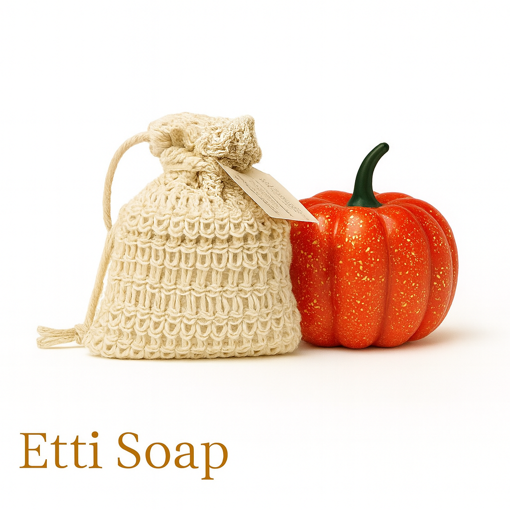Beige crocheted soap bag with a pumpkin next to it on a white background, featuring the brand 'Etti Soap'.