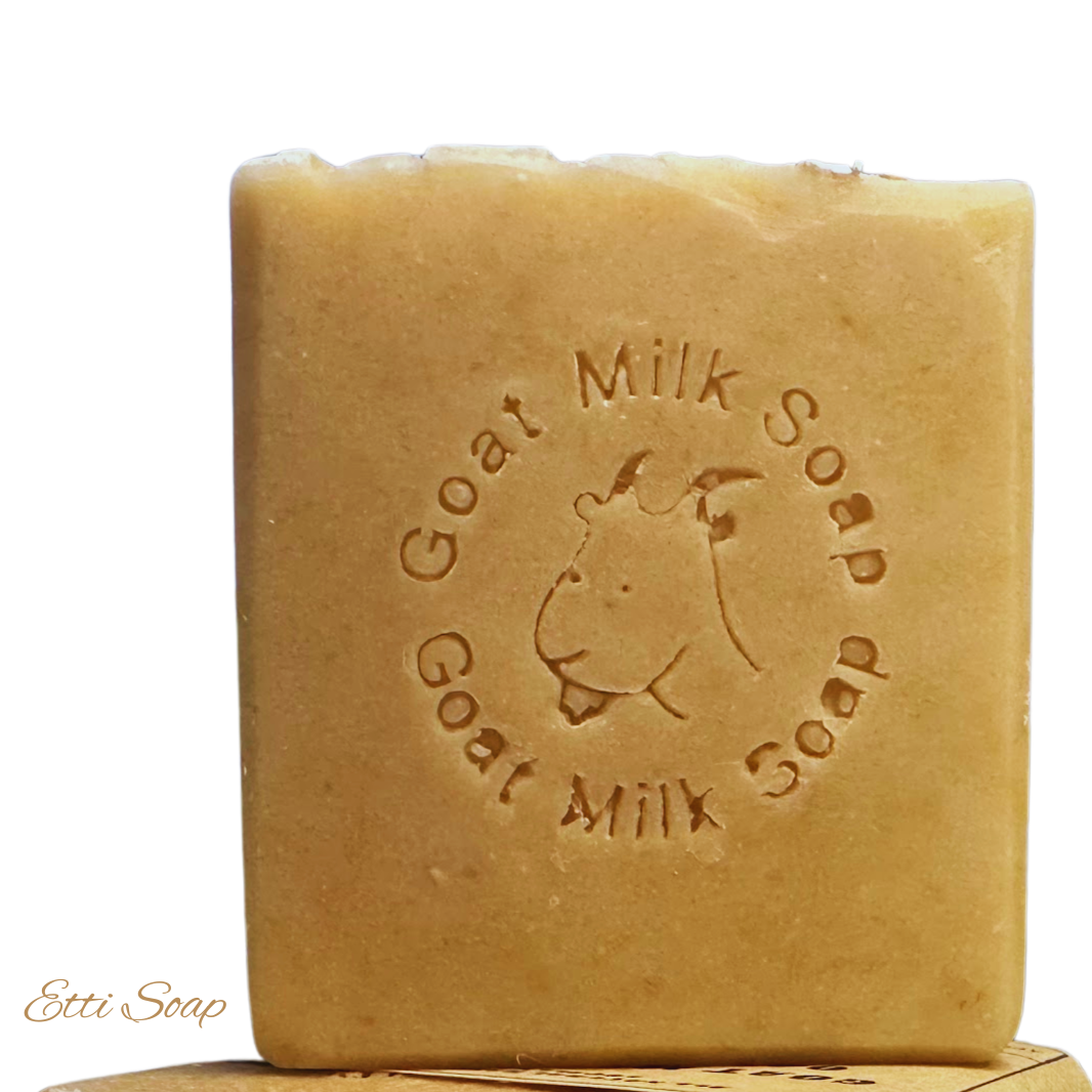 Bar of goat milk soap with 'Etti Soap' branding on a white background