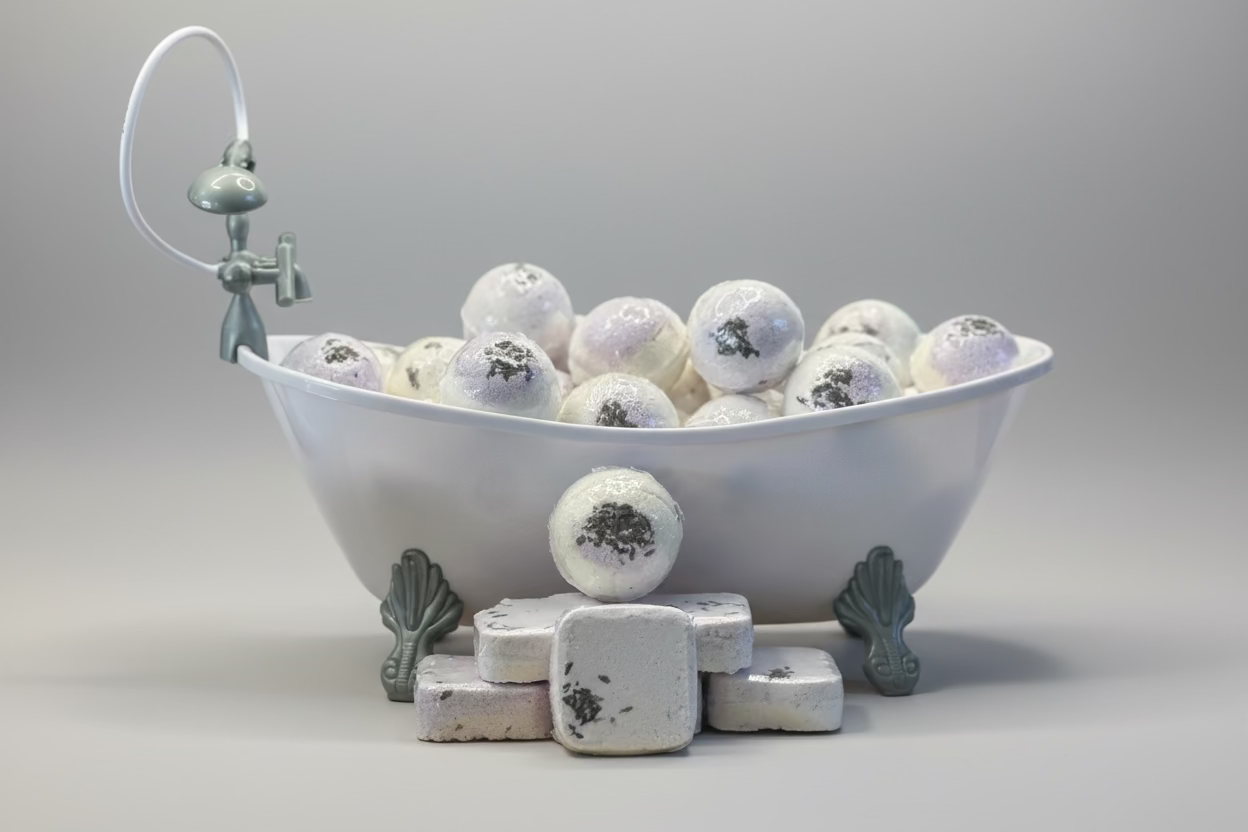 Decorative bathtub with bath bombs on a wooden stand in a kitchen setting