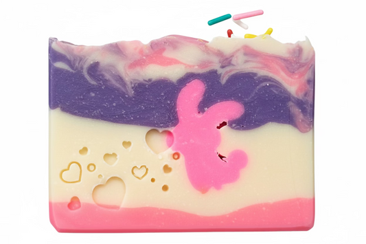Bar of soap with a pink butterfly design on a gray background
