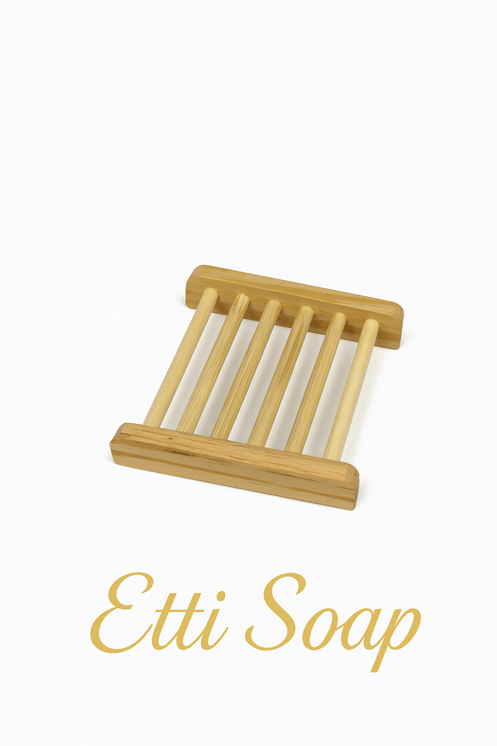 Bamboo soap dish with white soap on a white background, branded 'Etti Soap'.