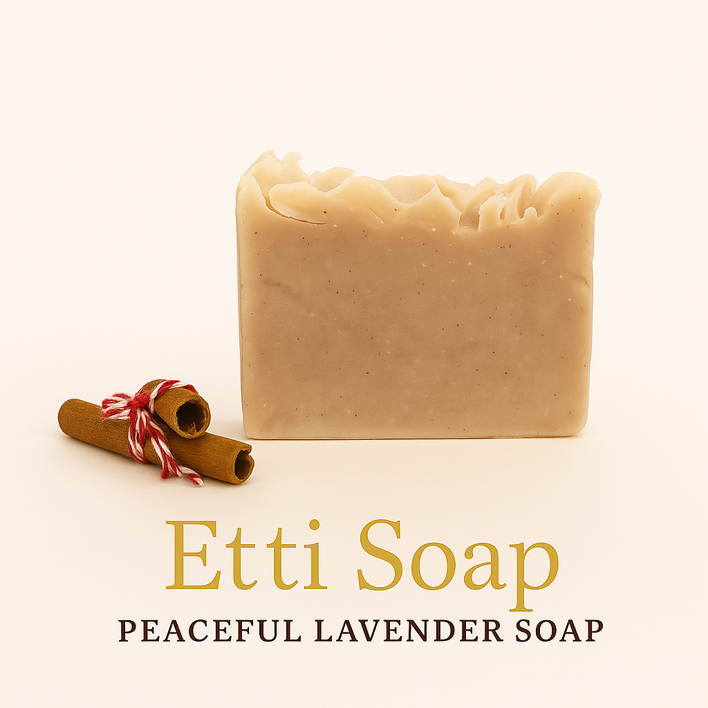 Bar of Etti Soap with a cinnamon stick on a light background